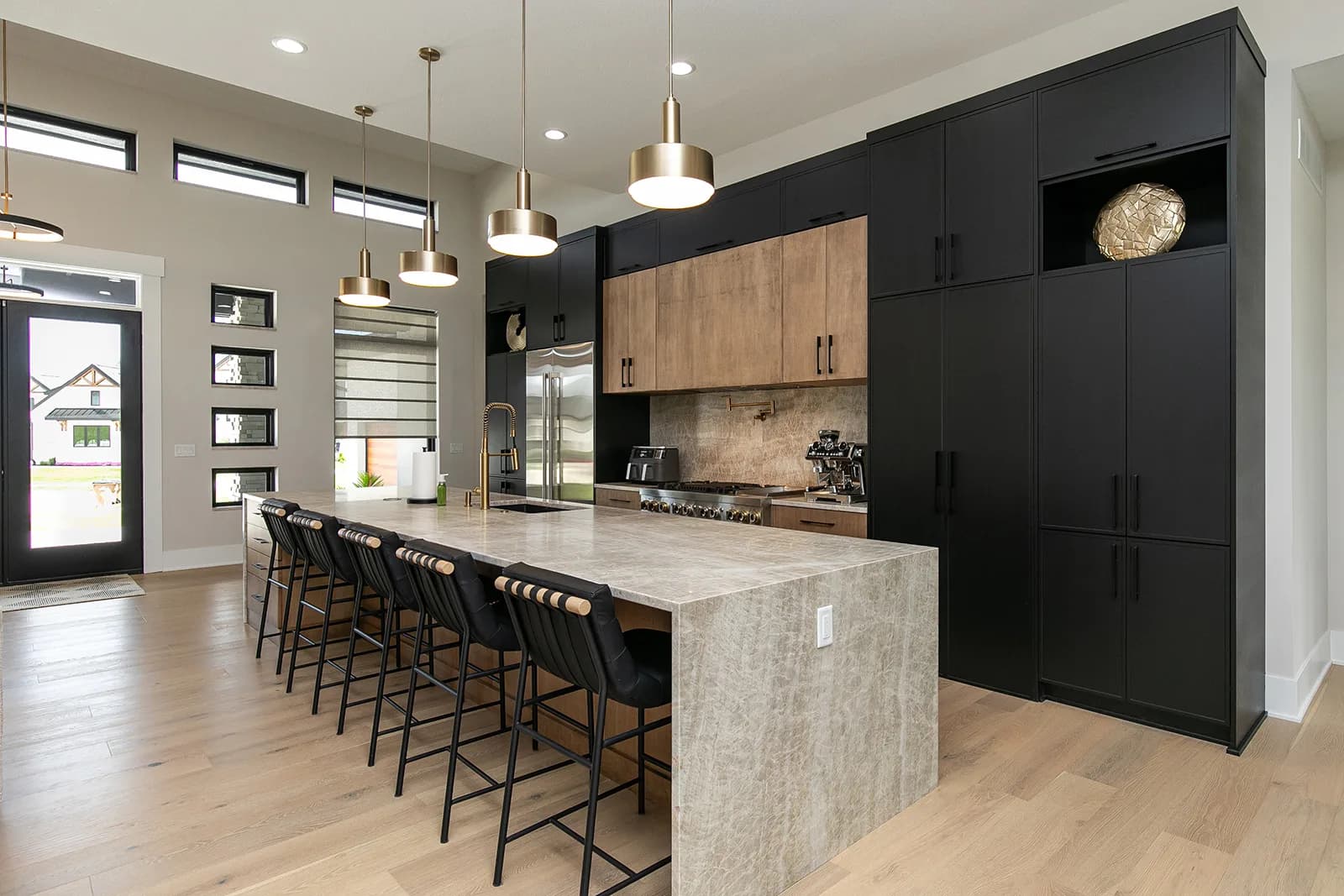 Luxury kitchen island with bar seating — 3856 NW 177th Ct
